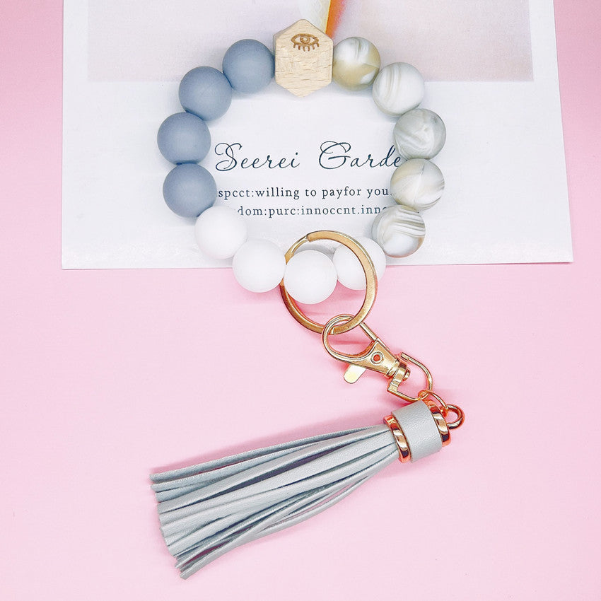 Llavero bohemio de la muñeca de la borla del cuero al por mayor del silicón